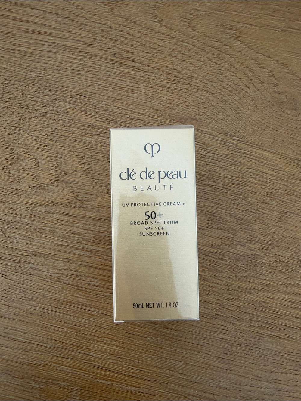 Cle de Peau UV Protective Cream SPF 50+ - Gold